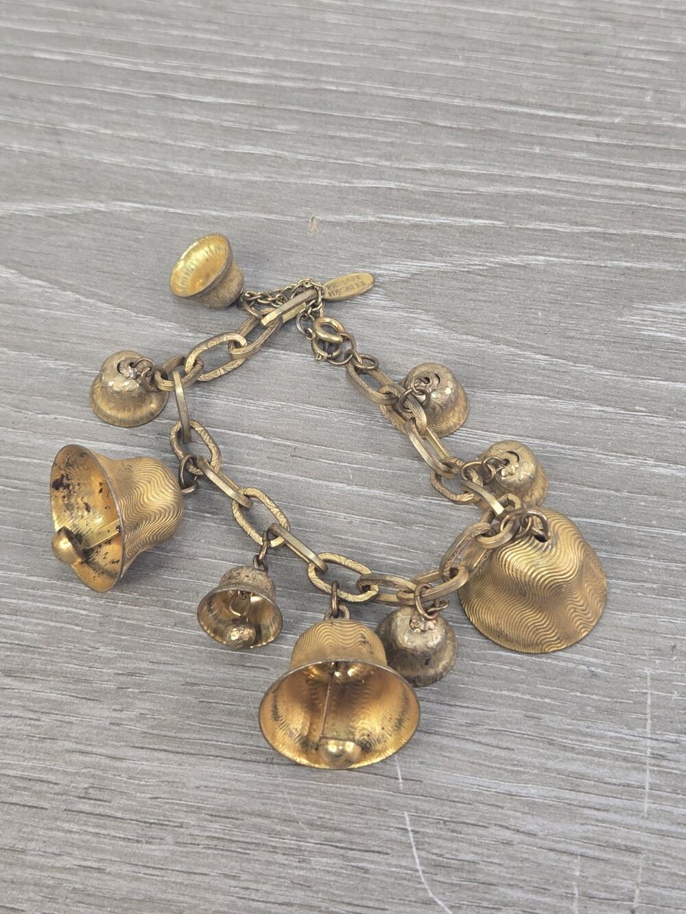 Signed Miriam Haskell Gold Tone Floral Embossed Jingle Bell Charm Bracelet